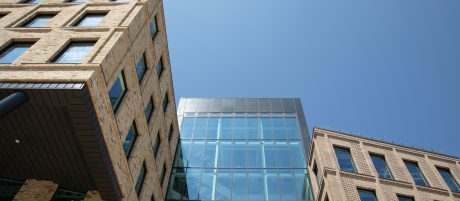 View looking up at large multi-storey building