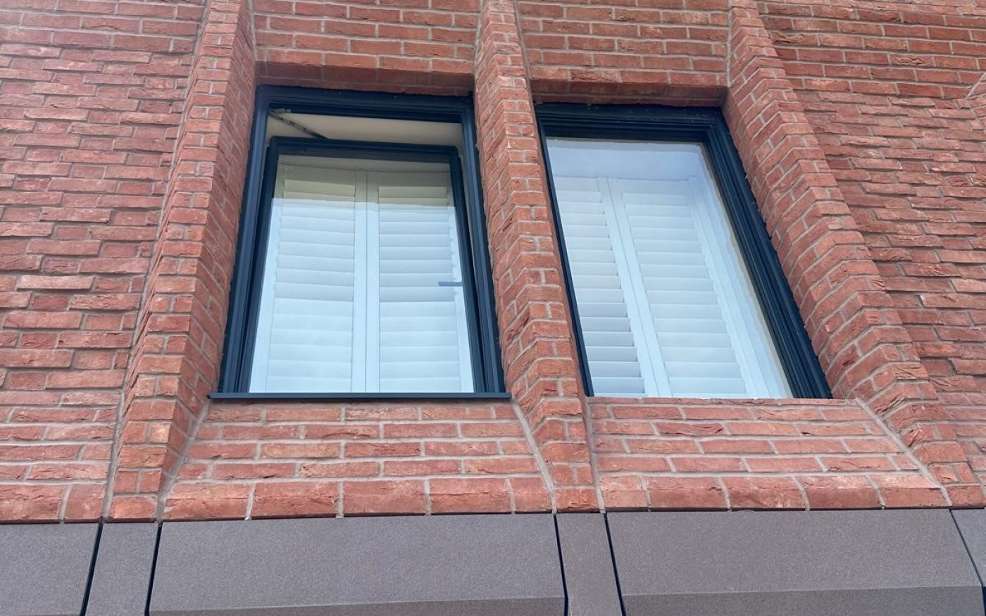 Close up of the brick details and large windows