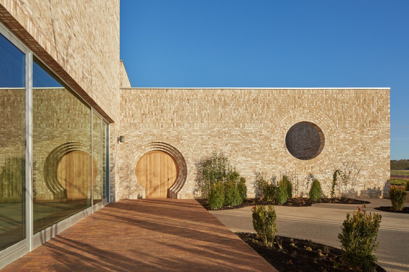 Modern brick building with circular door