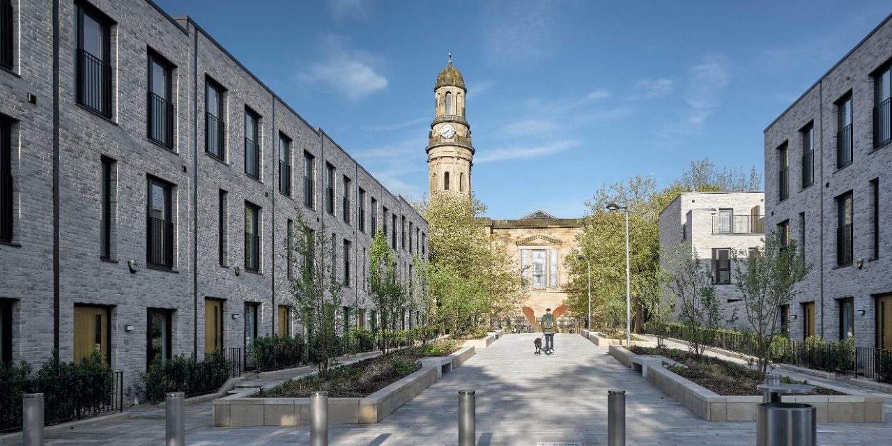 Timekeepers Square with paved area and trees