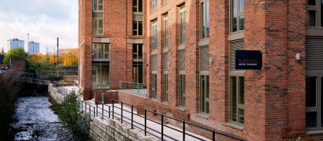Mutli-storey apartment alongside beautiful canal