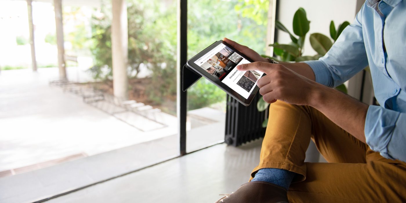Man holding ipad