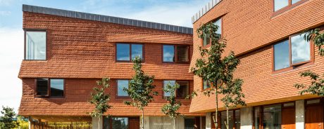 Modern house with vertical clay tiled walls