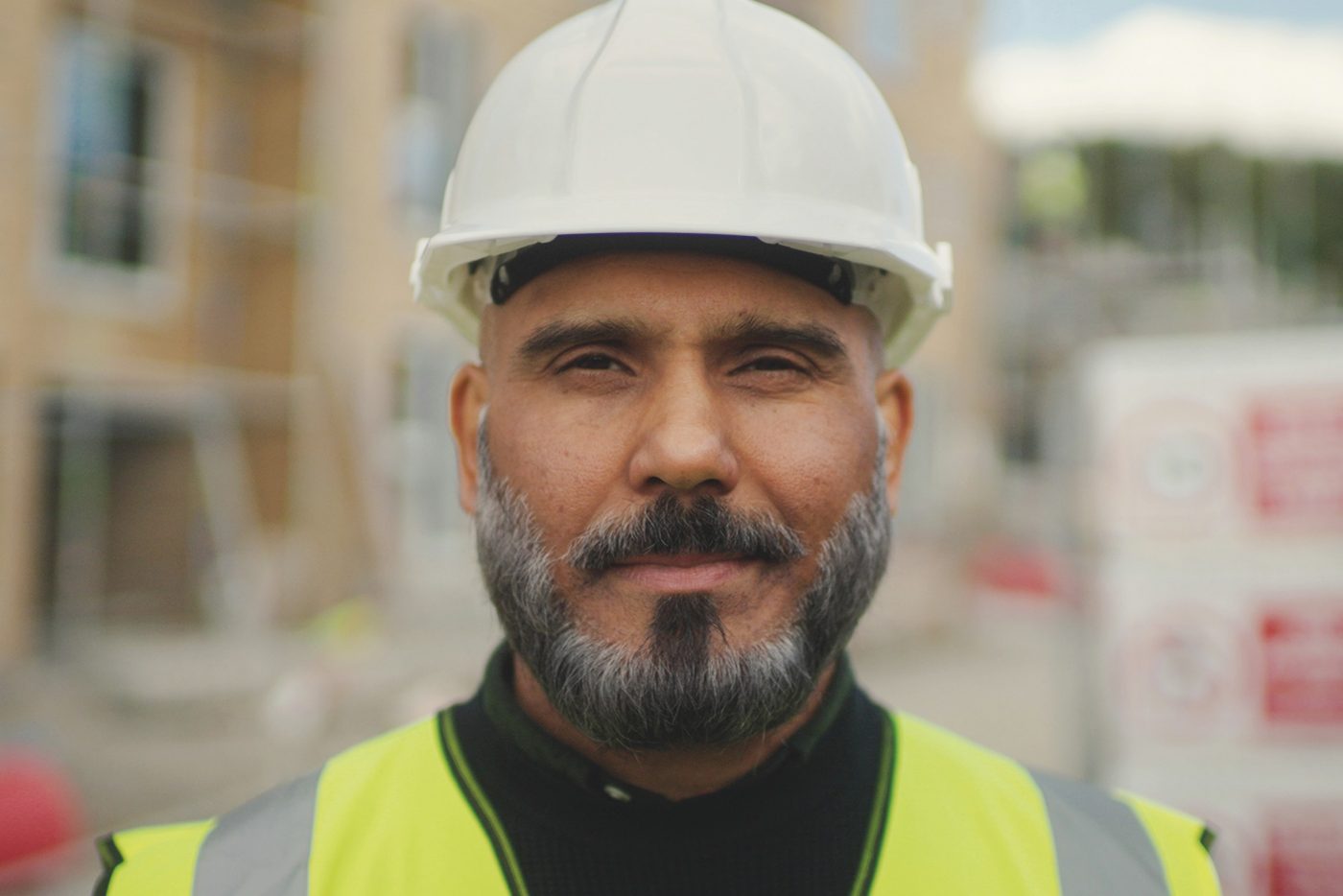Man in hard hat on building site