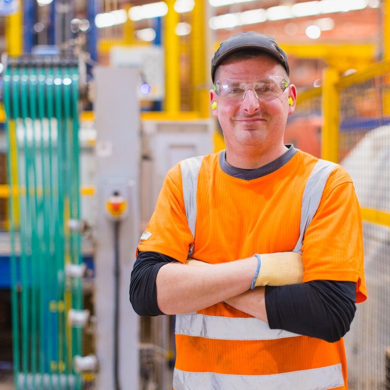 Man in safety clothing with arms folded in wienerberger factory
