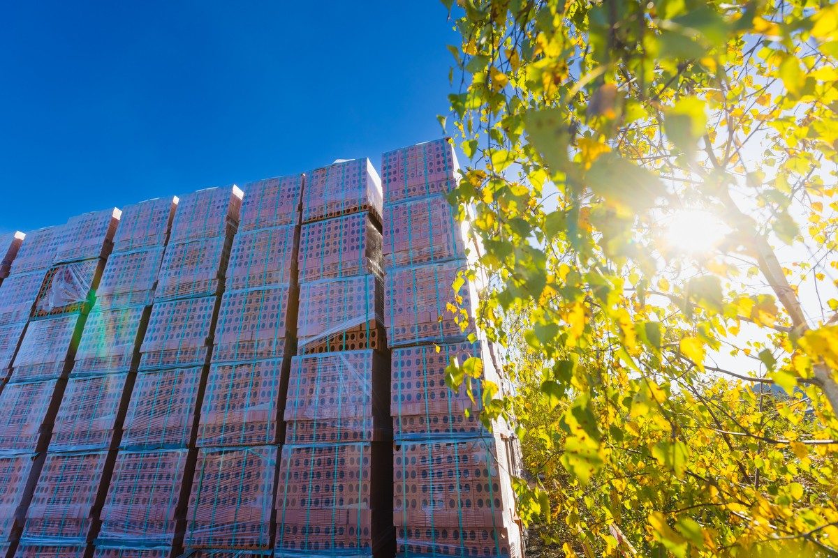 Pallets of bricks and trees