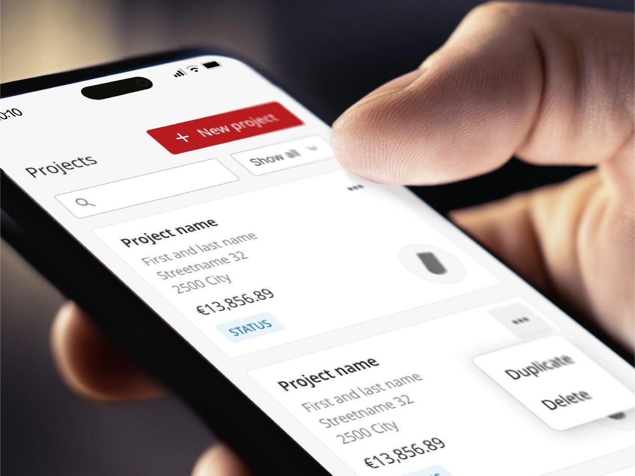 phone being held in a hand with All4Roof tool on mobile screen