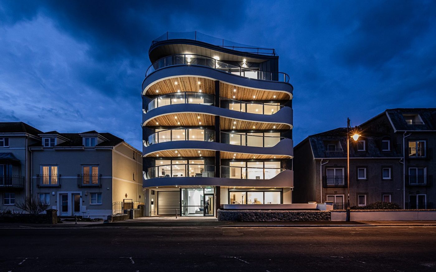 Exterior of Seaton Beach apartment block at night