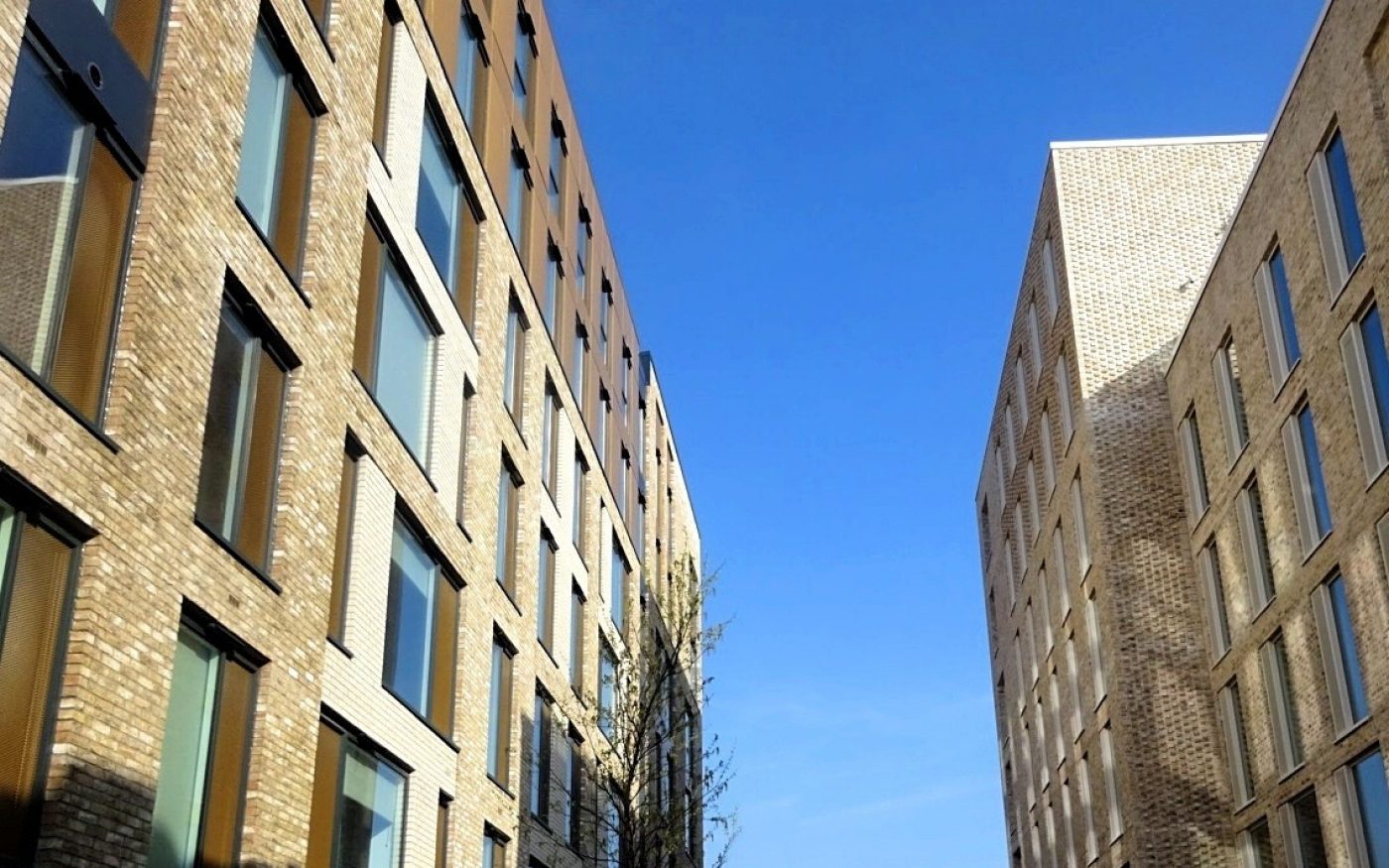 Two modern brick apartment buildings