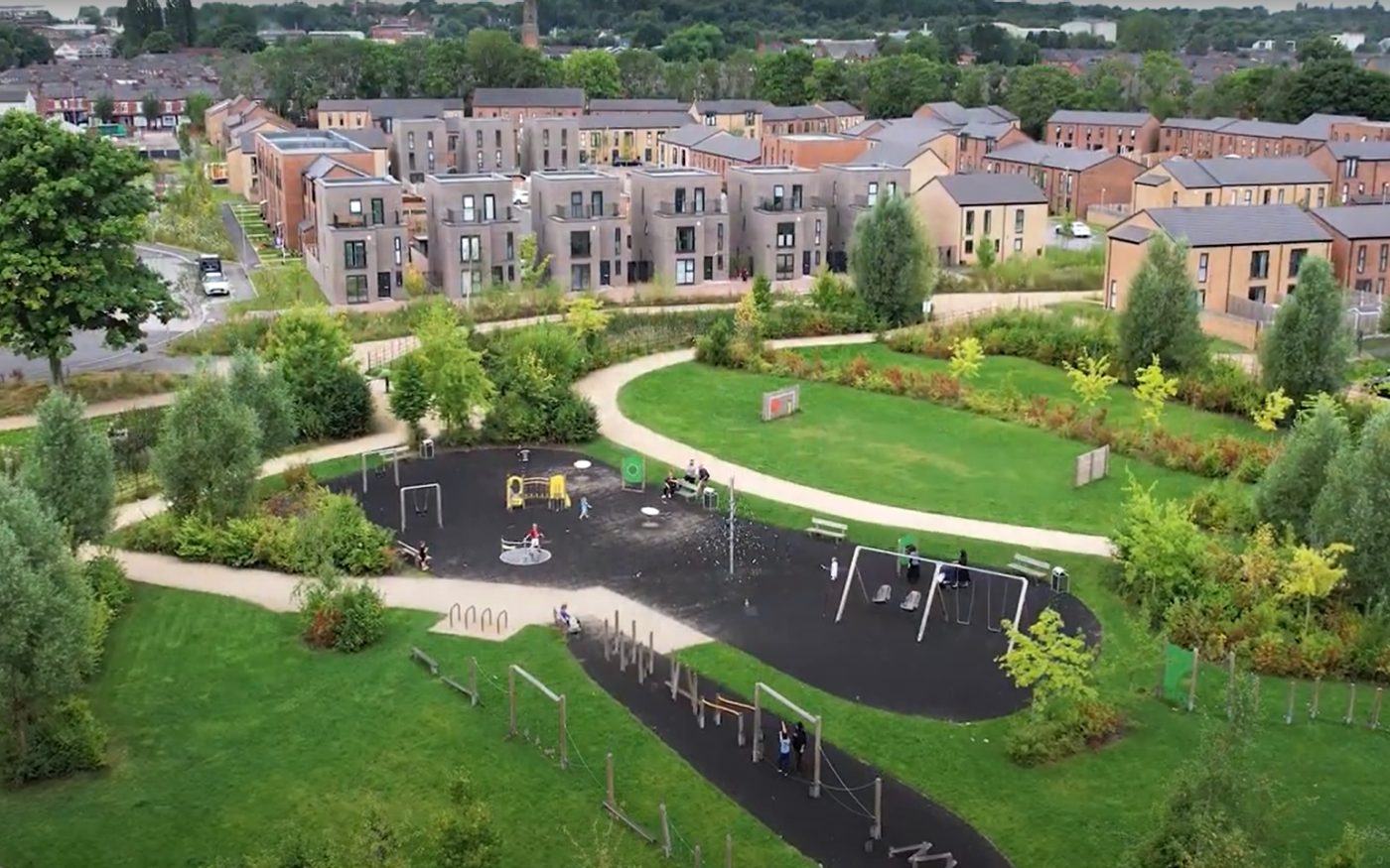 Birds eye view of a park and residential green space