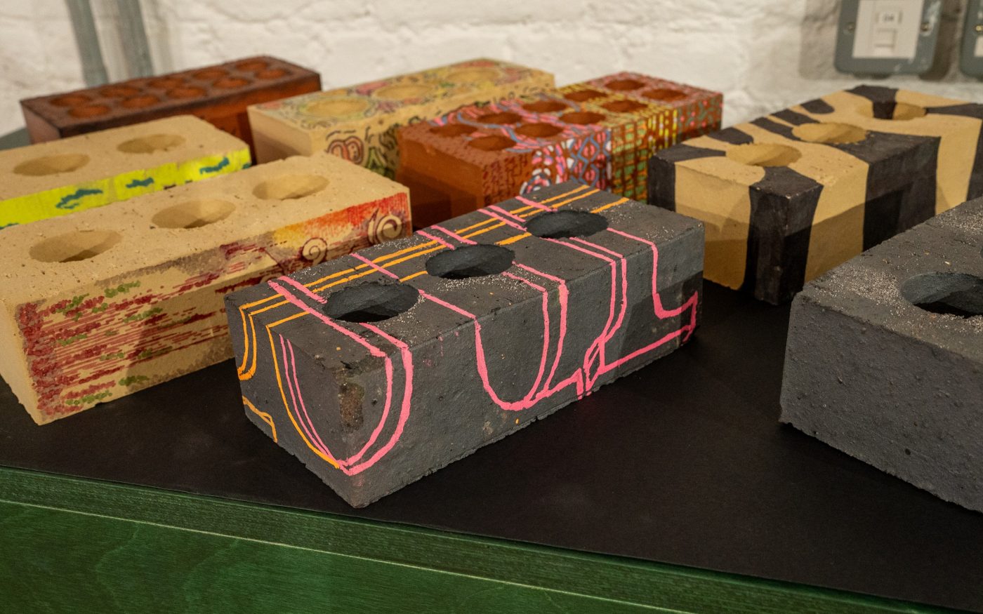 Numerous creative brick designs on display