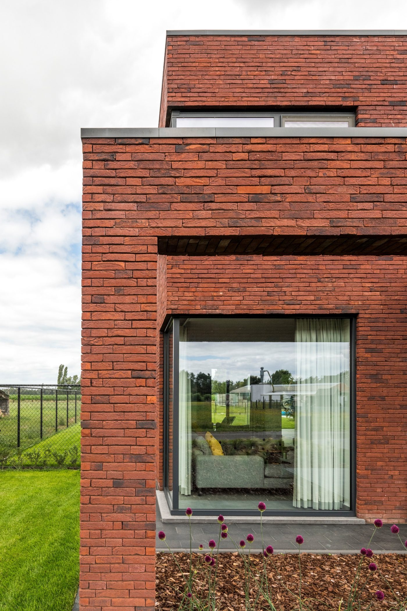 Exterior of modern building with eco-brick facade