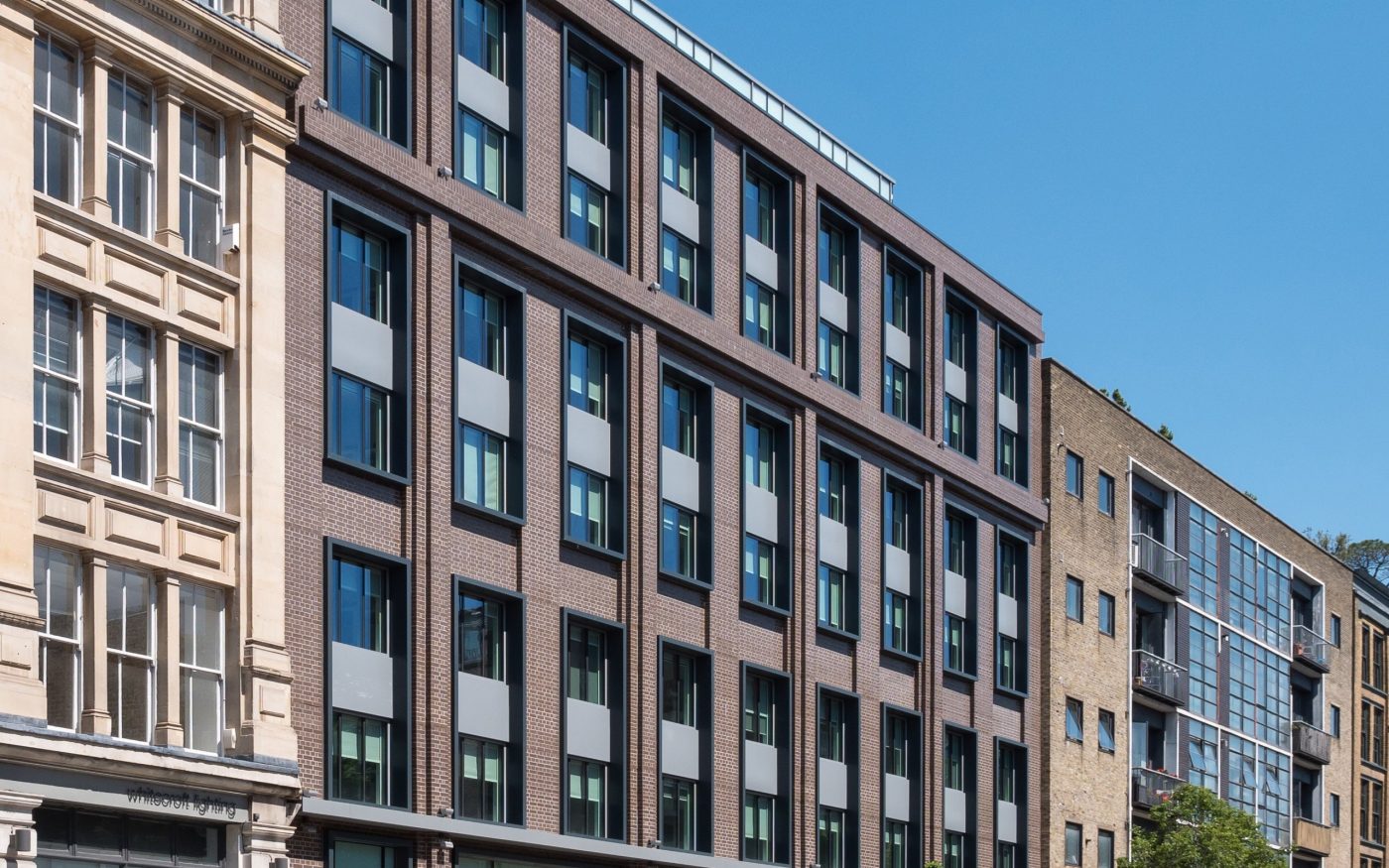 Exterior of Yotel London City in taupe glazed bricks