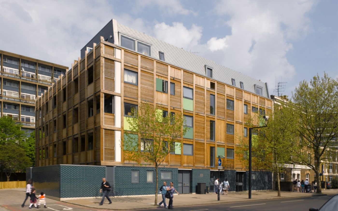 Wardroper House project with wooden and glazed brick exterior