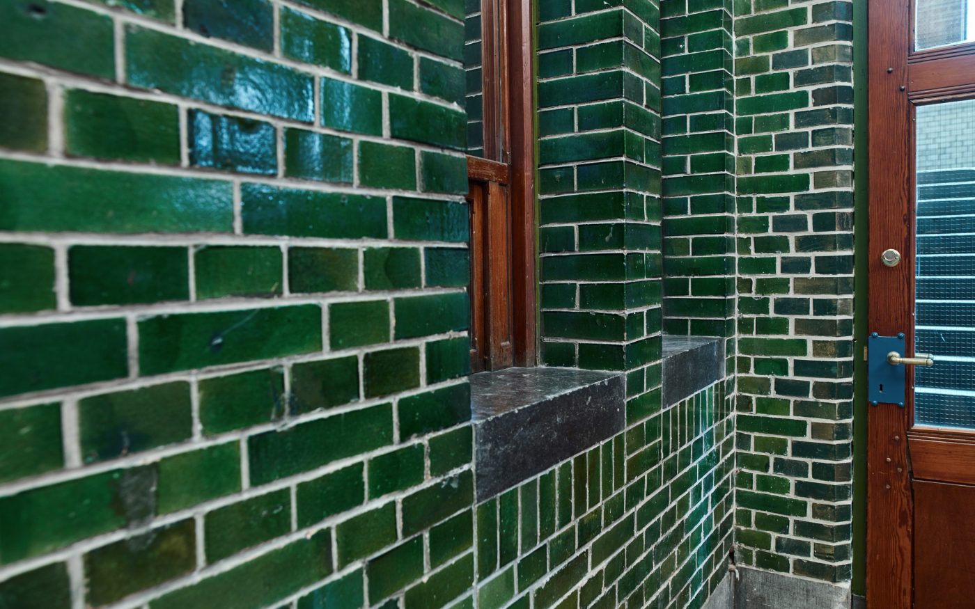 Internal green glazed brickwork on building in Amsterdam