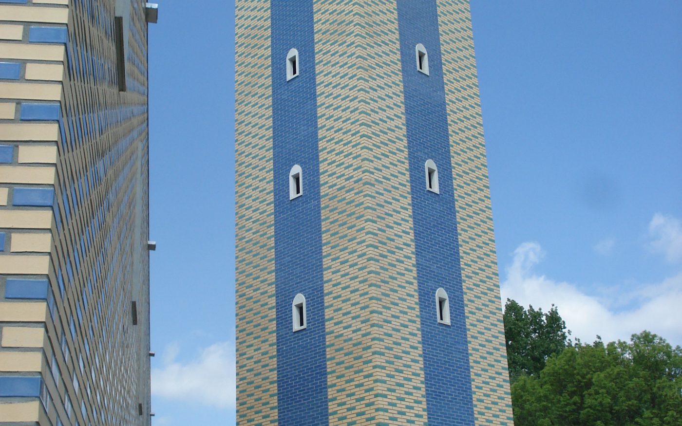 Blue glazed bricks paired with cream bricks on a mosque building