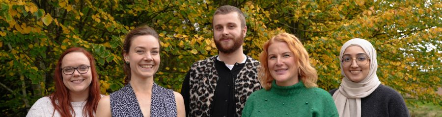 5 members of the sustainability team stood smiling together