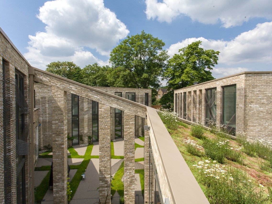 Asymmetrical roof and columns of modern residential building