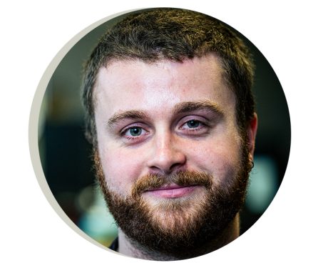 Circular head shot of Tom Rogerson