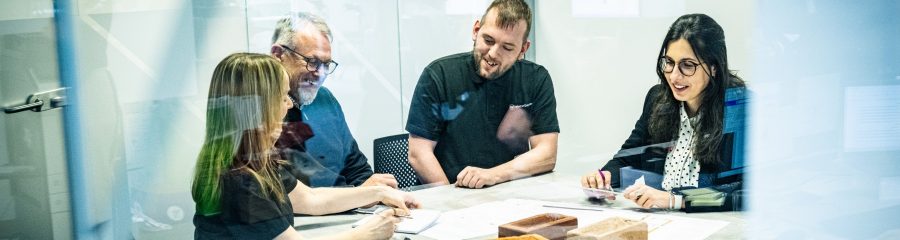 Commercial propersitions team sat in a meeting