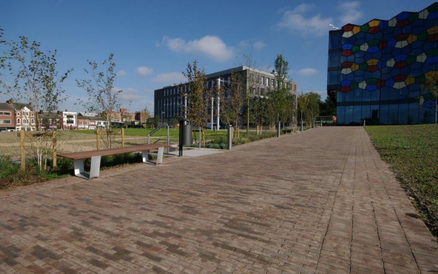 Clay paved path outside building