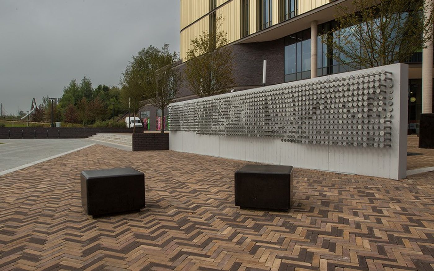 Clay paved path outside building