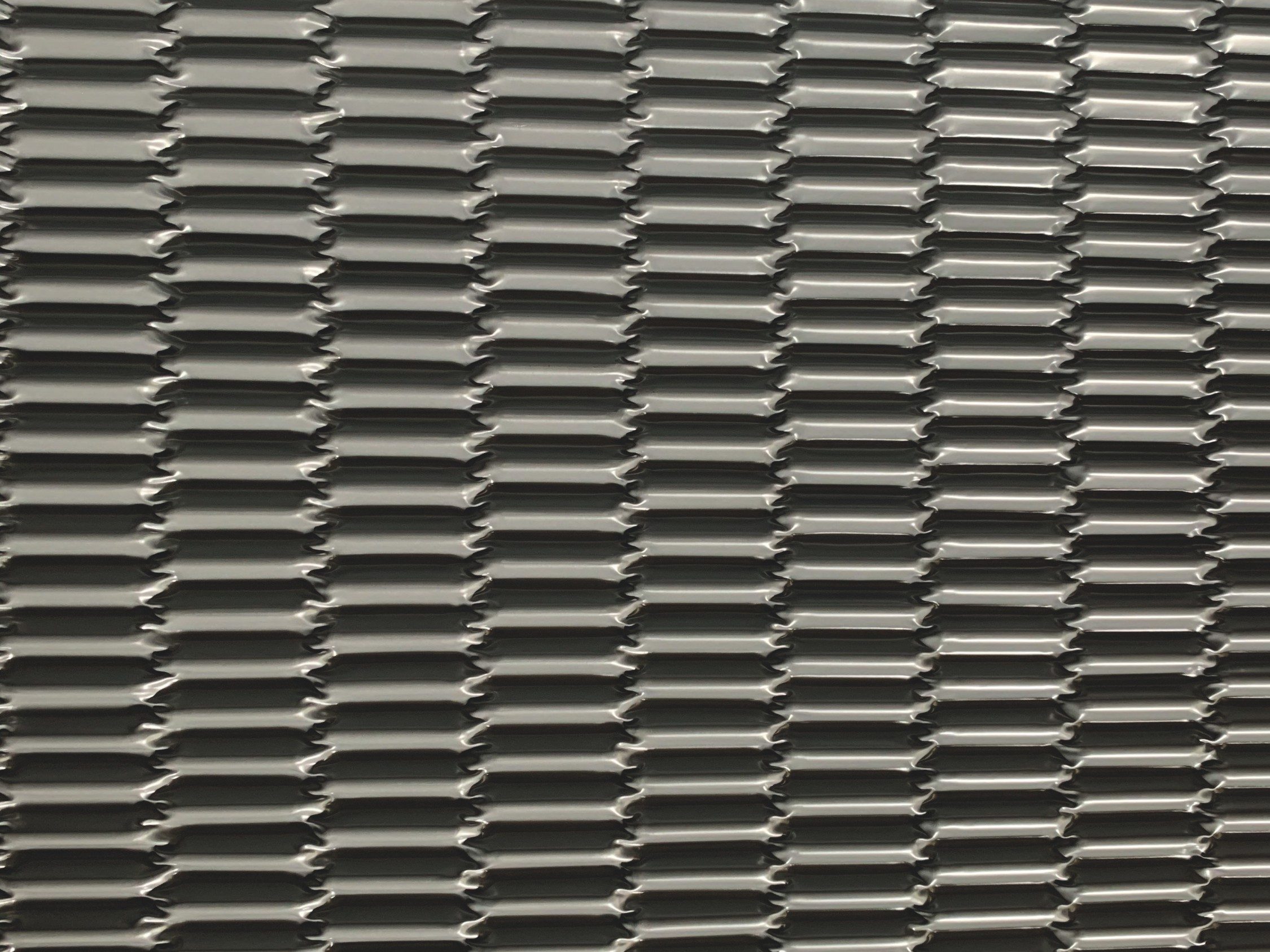 An textured image of Cross-corrugated flash finish.