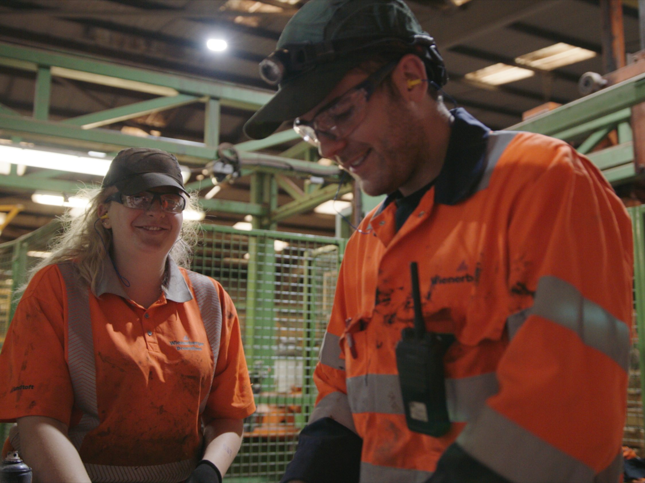 Man and woman in safety gear at Broomfleet factory