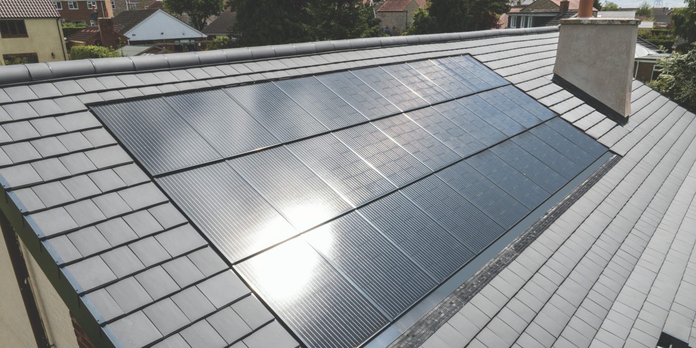 In roof solar installed onto a large grey roof