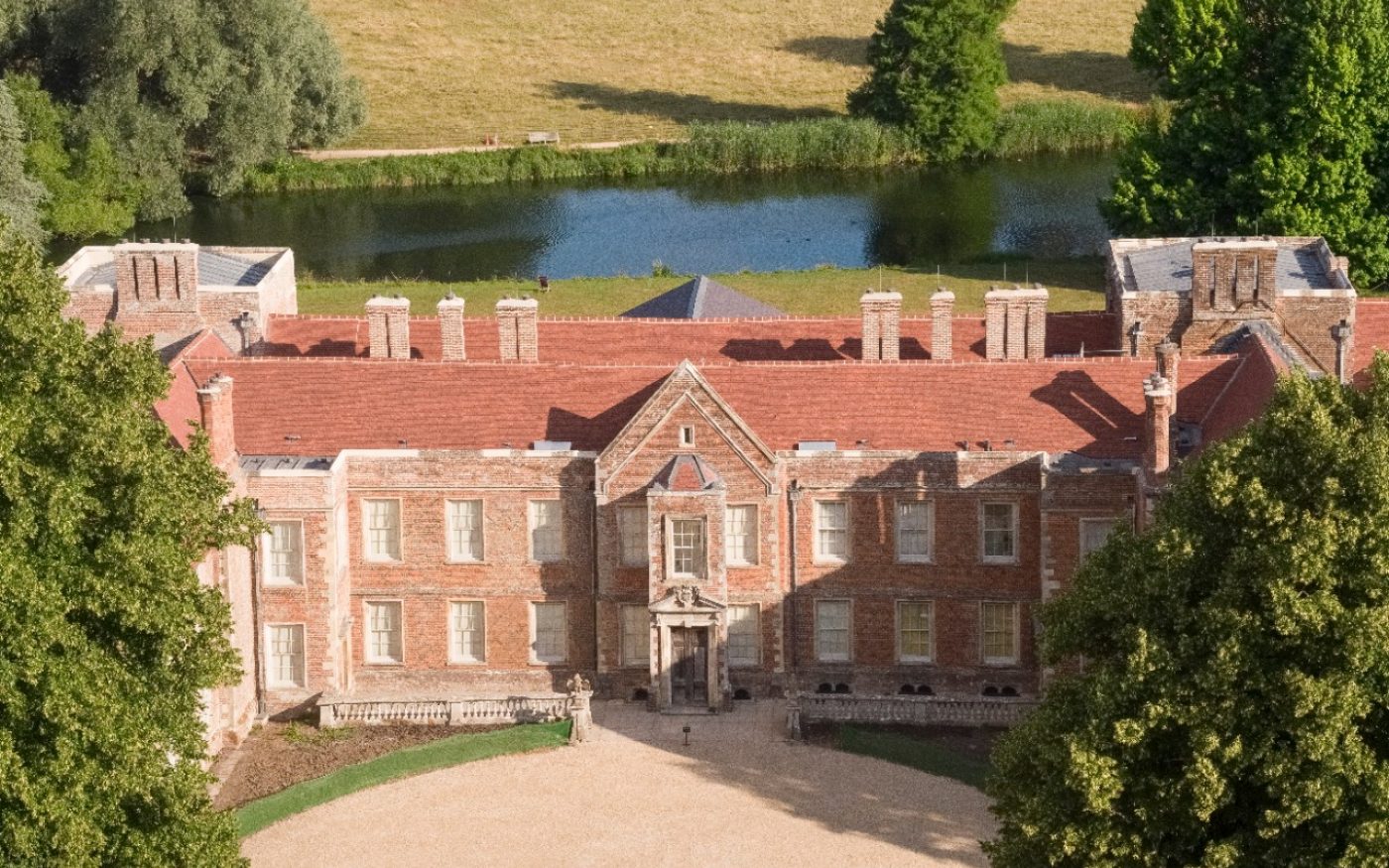 Aerial view of The Vyne Tudor mansion in beautiful landscape