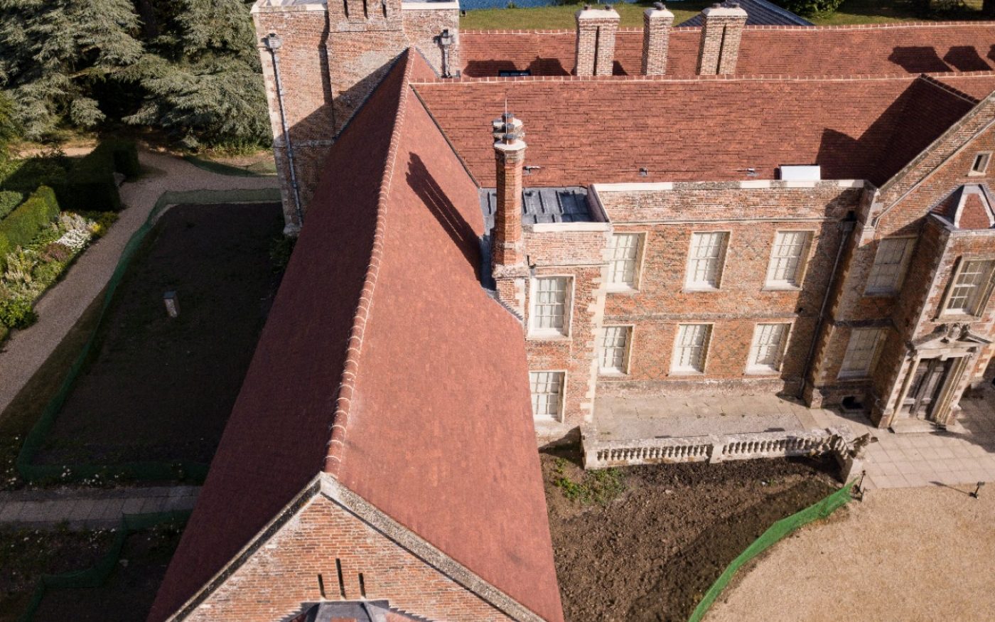 Newly refurbished roof using handmade clay roof tiles on the Vyne