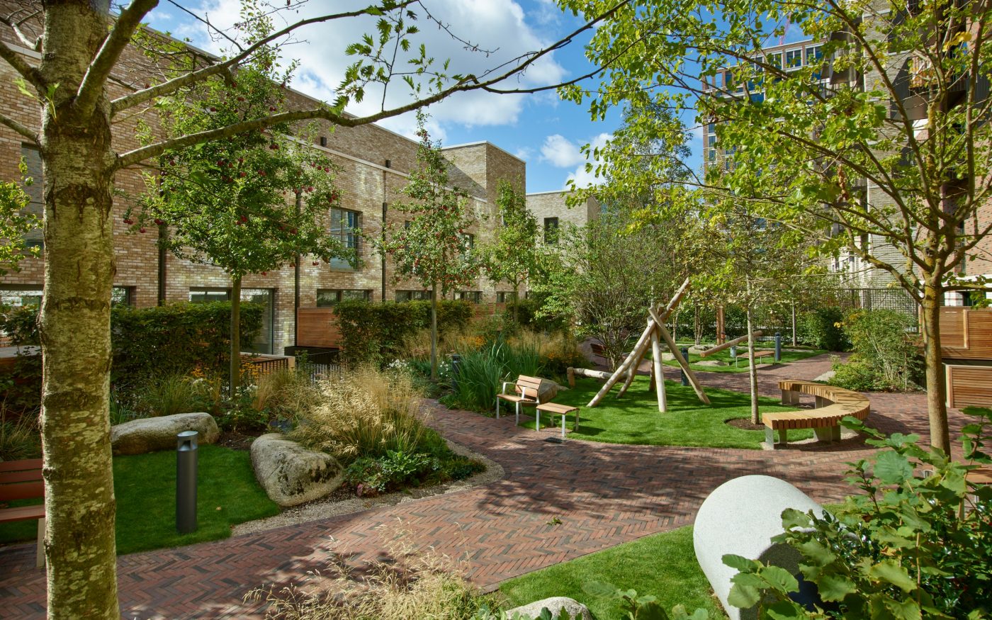 Green area around paths between apartment complex