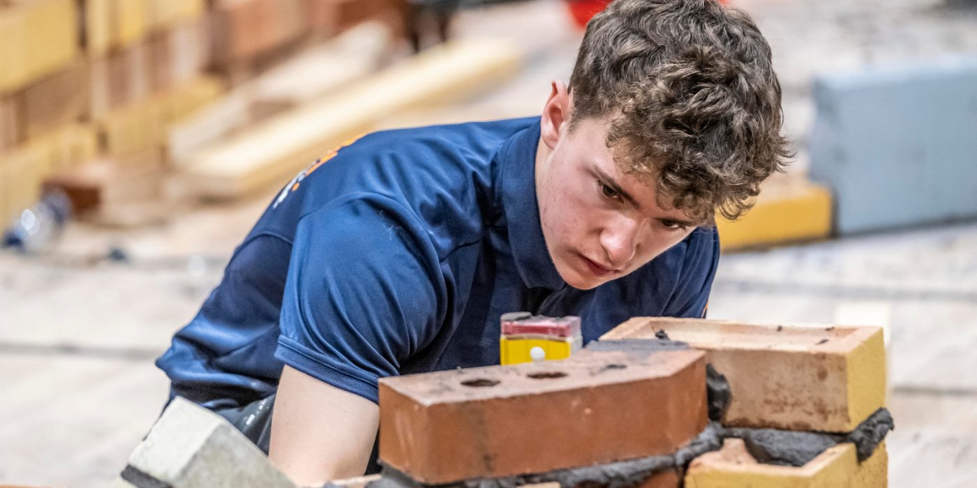 Robot arm on production line at solar panel plant