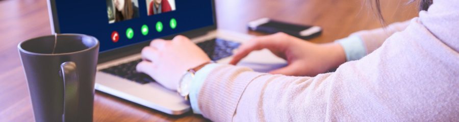 Man on a virtual planning meeting on laptop