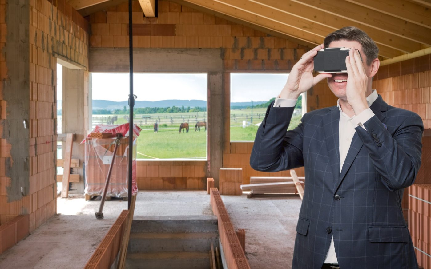 Man holding phone as VR headset