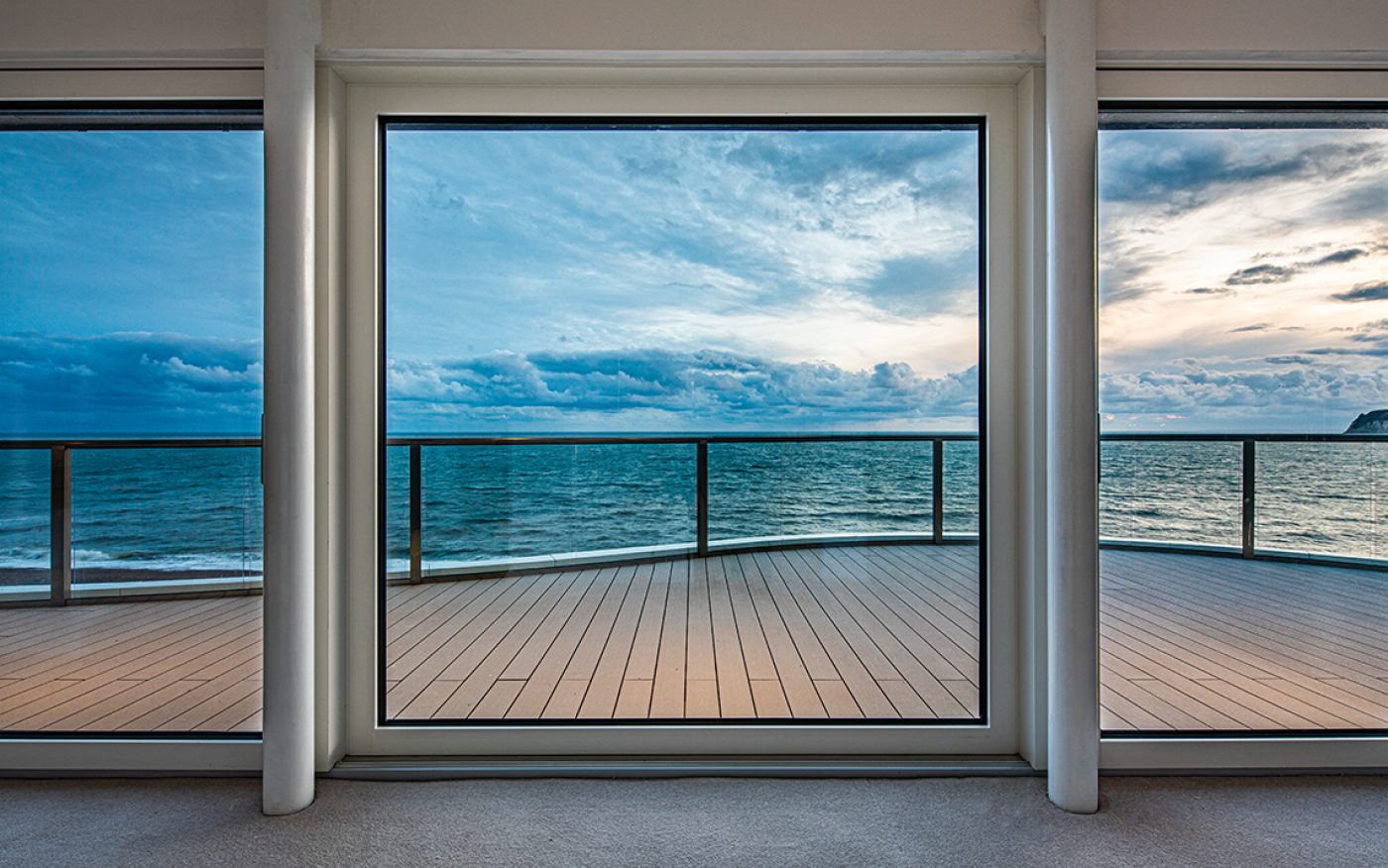 Sea view through floor-to-ceiling windows