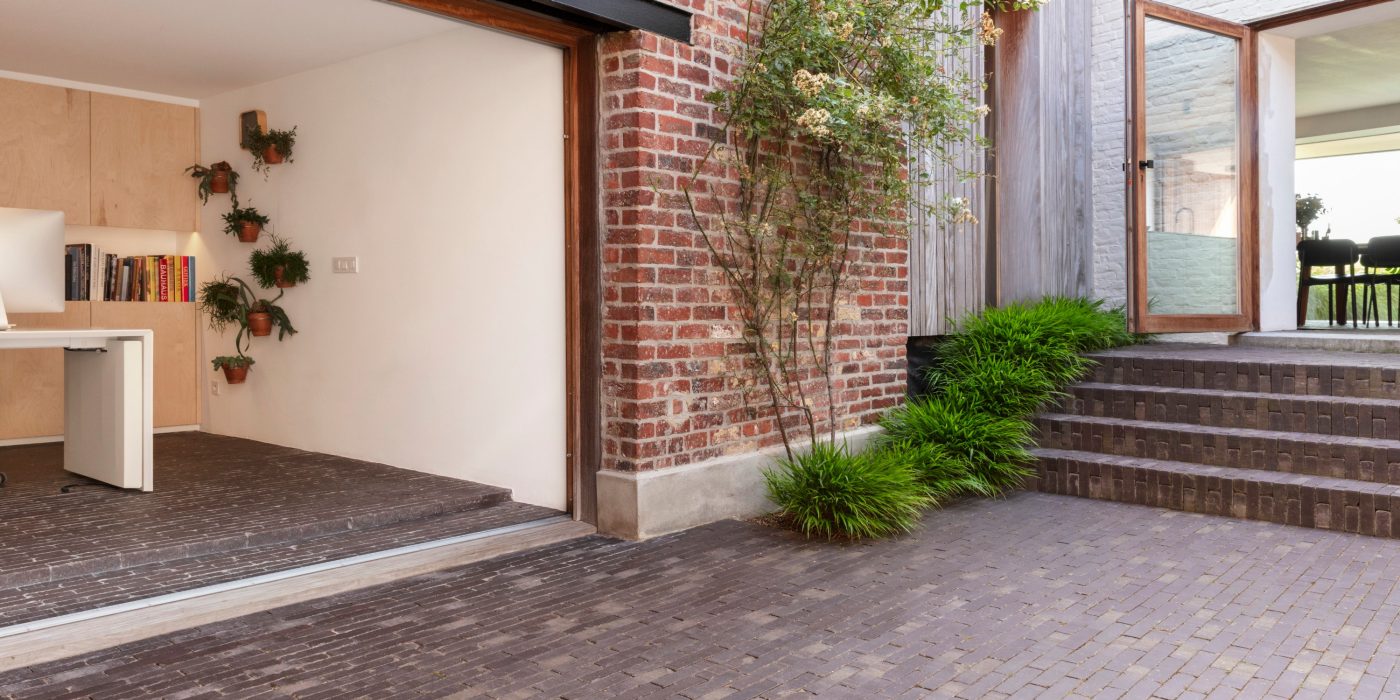 Modern garden with clay paved area