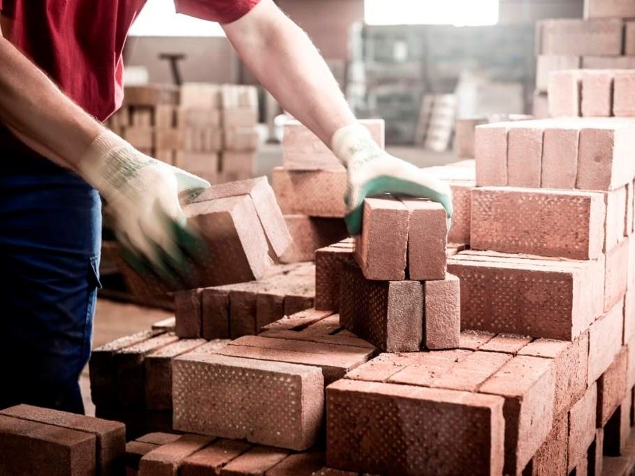 An image showing clay pavers in factory.