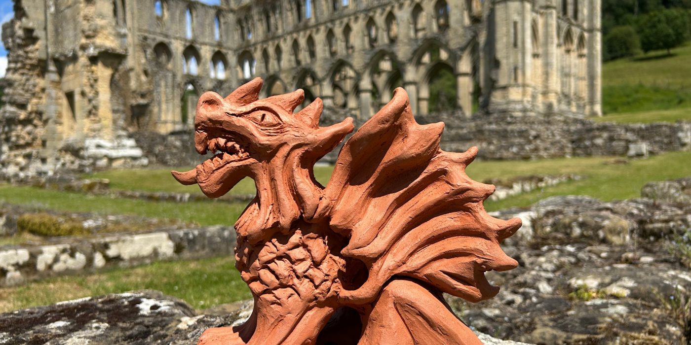 Clay sculpted dragon at an abbey ruins
