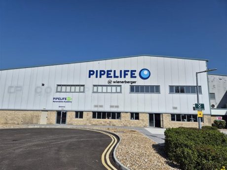 Image of the blue Pipelife wienerberger logo on the front of the factory