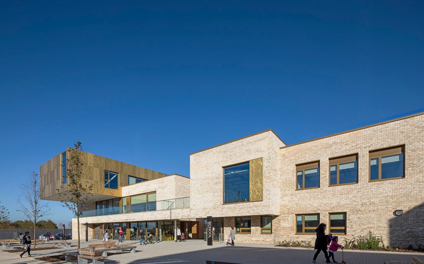 People walking outside Mulberry Park Community Hub