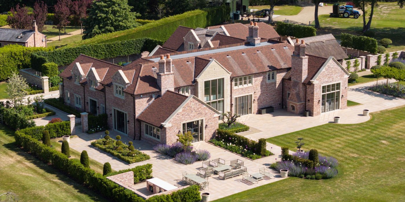 Large modern detached house with spacious landscaped gardens