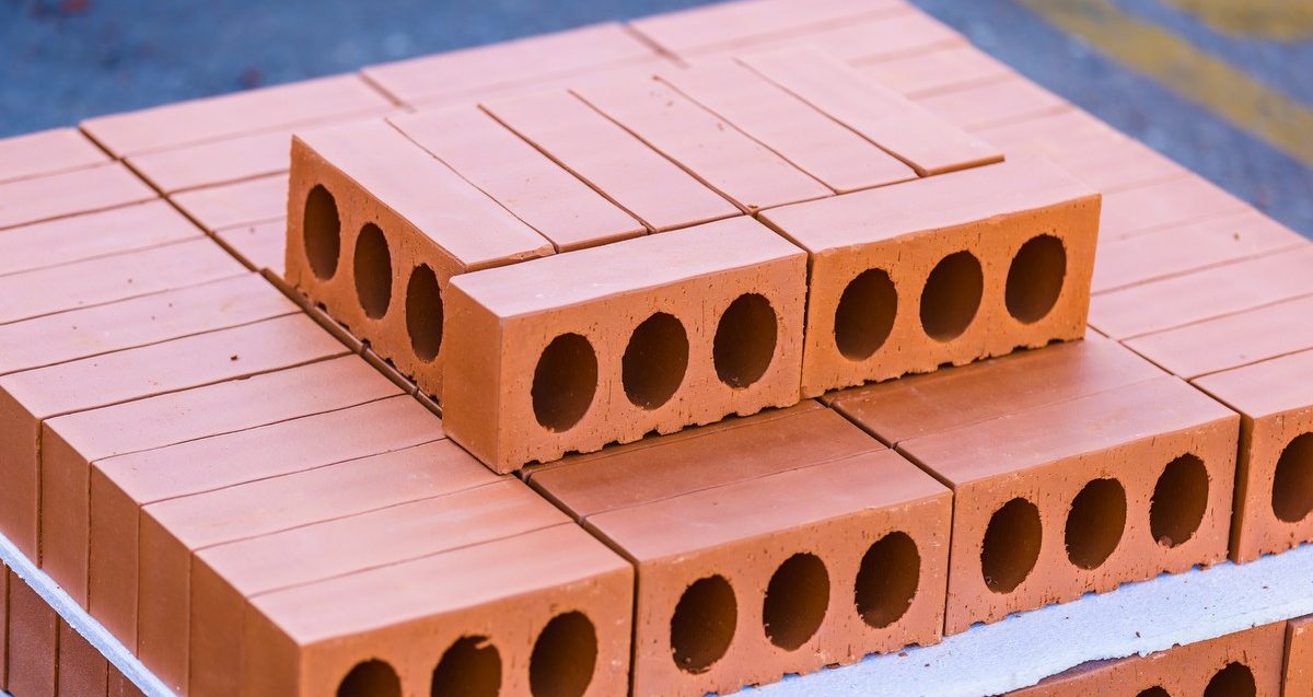 product pile of red clay bricks
