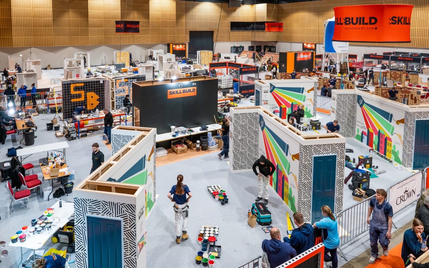 Many people in large hall taking part in the Skillbuild competition