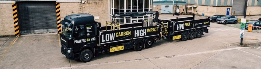 the UKs first HVO-powered brick delivery lorry that is black with yellow