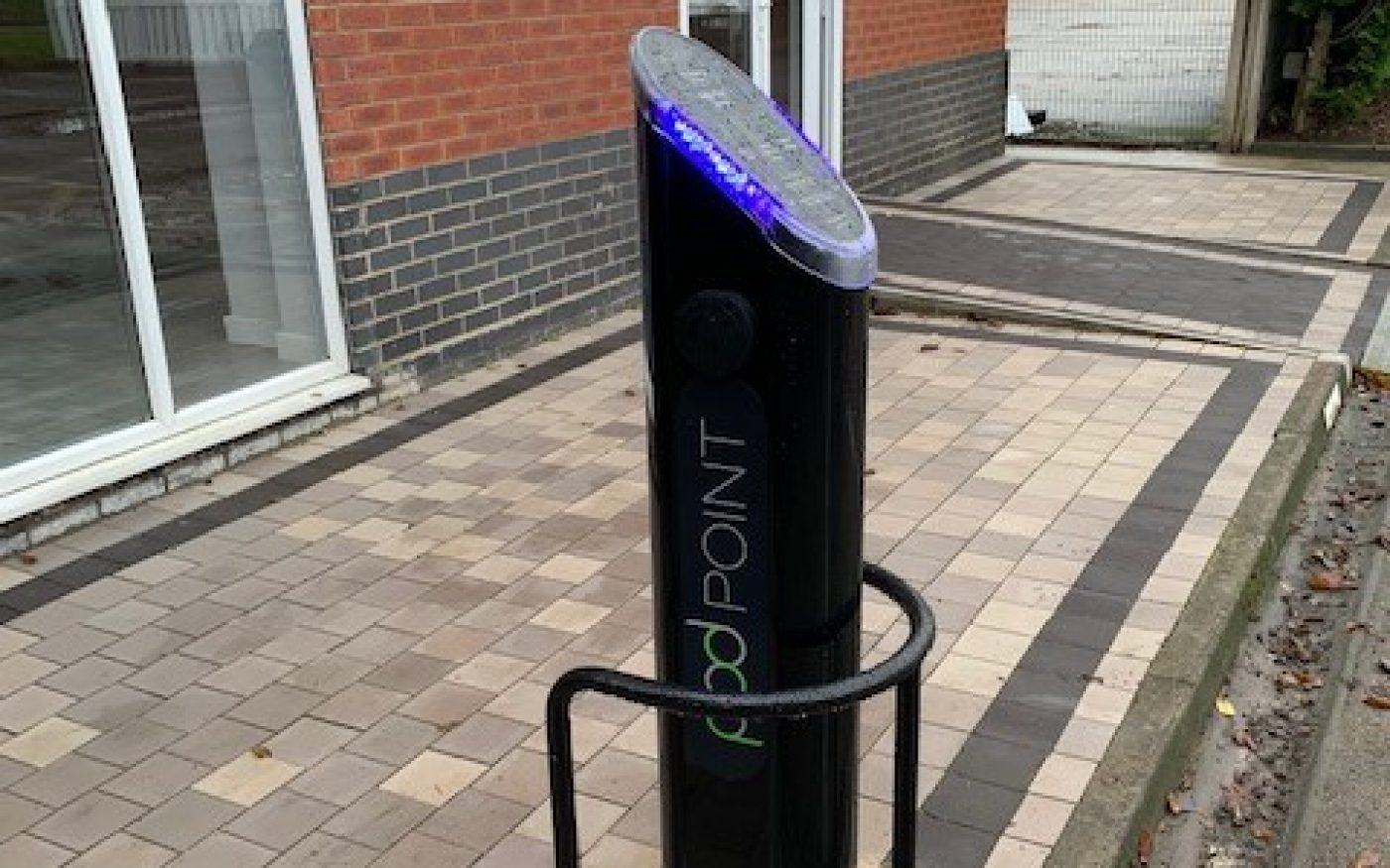 Man in lorry giving thumbs up, ready to deliver bricks