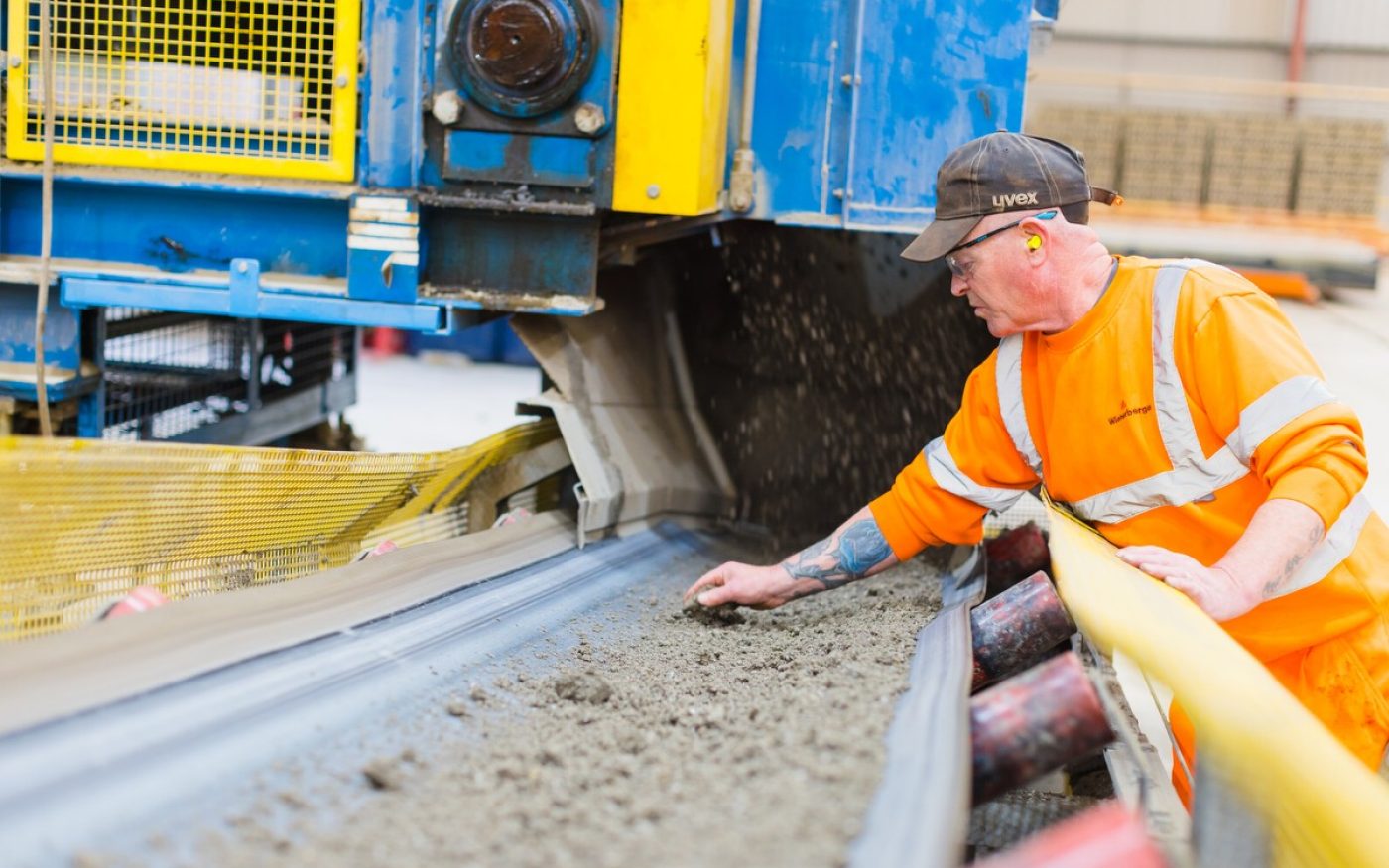 Man in lorry giving thumbs up, ready to deliver bricks