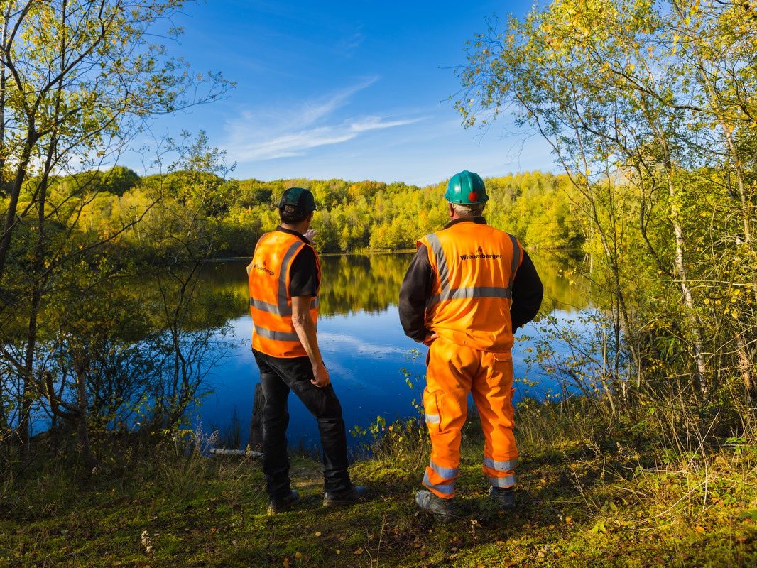 Two Wienerberger employees at Ewhurst lake nature site