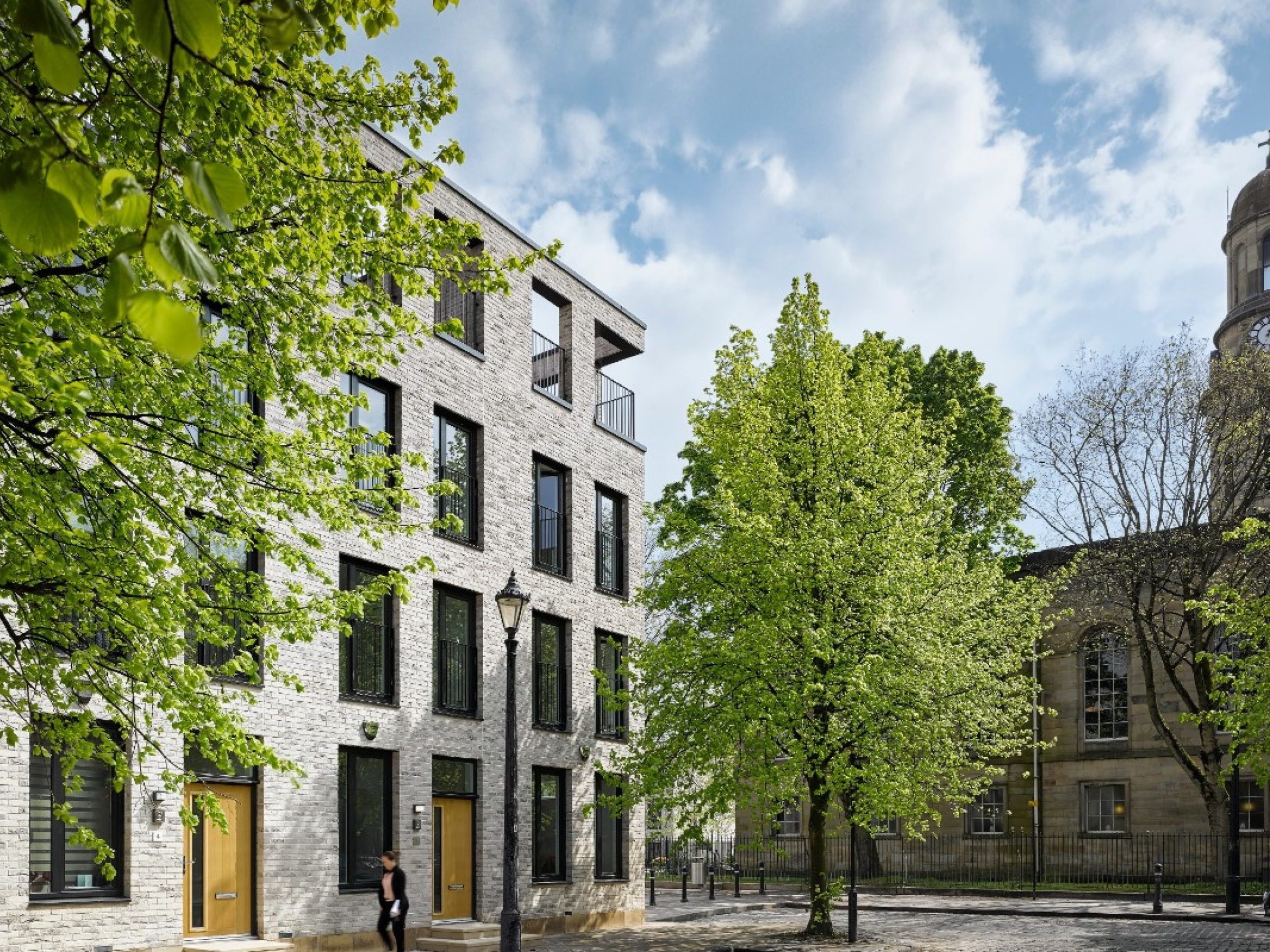 Modern terraced houses with trees