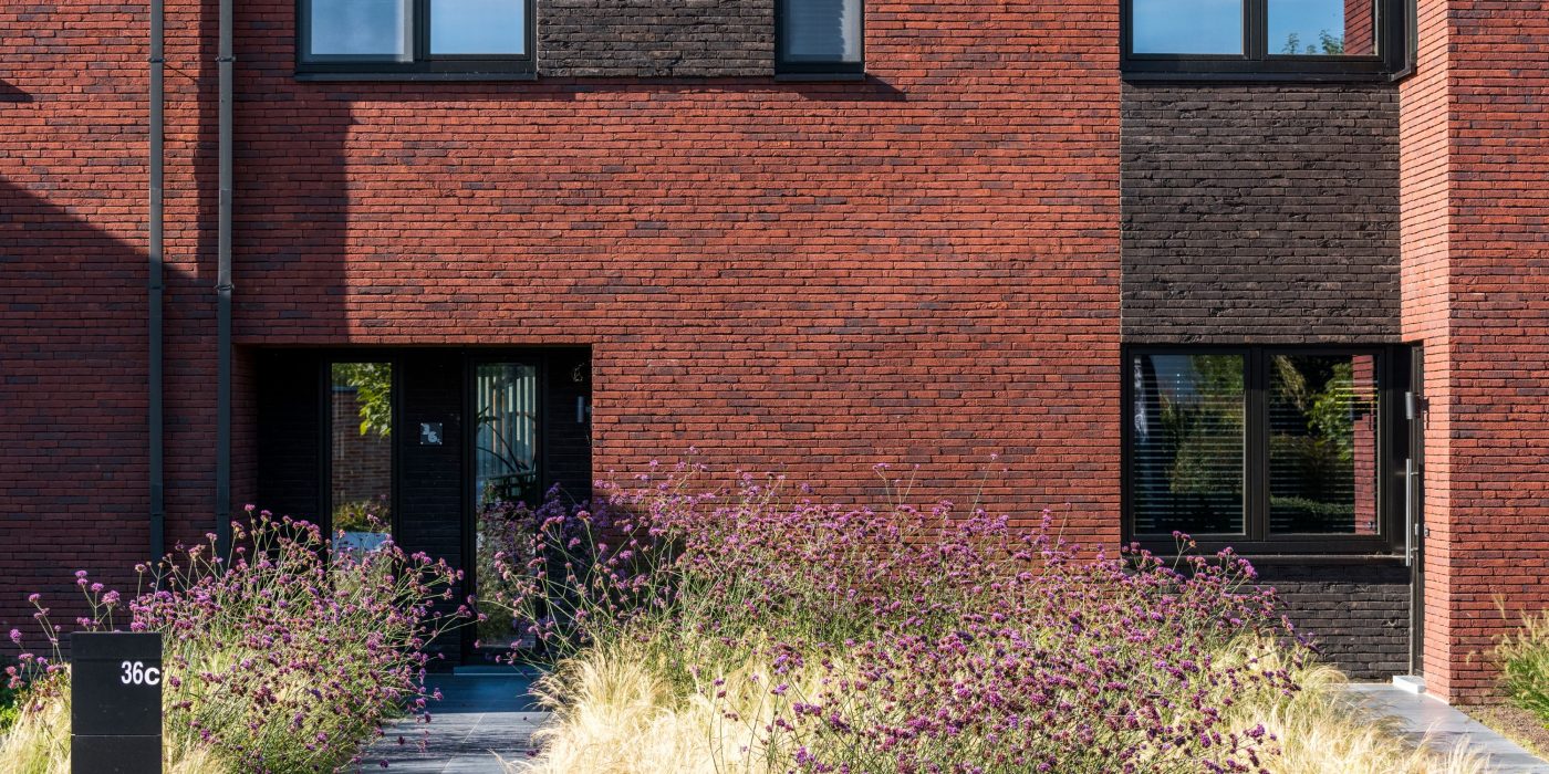 Eco-brick modern building with landscaped garden